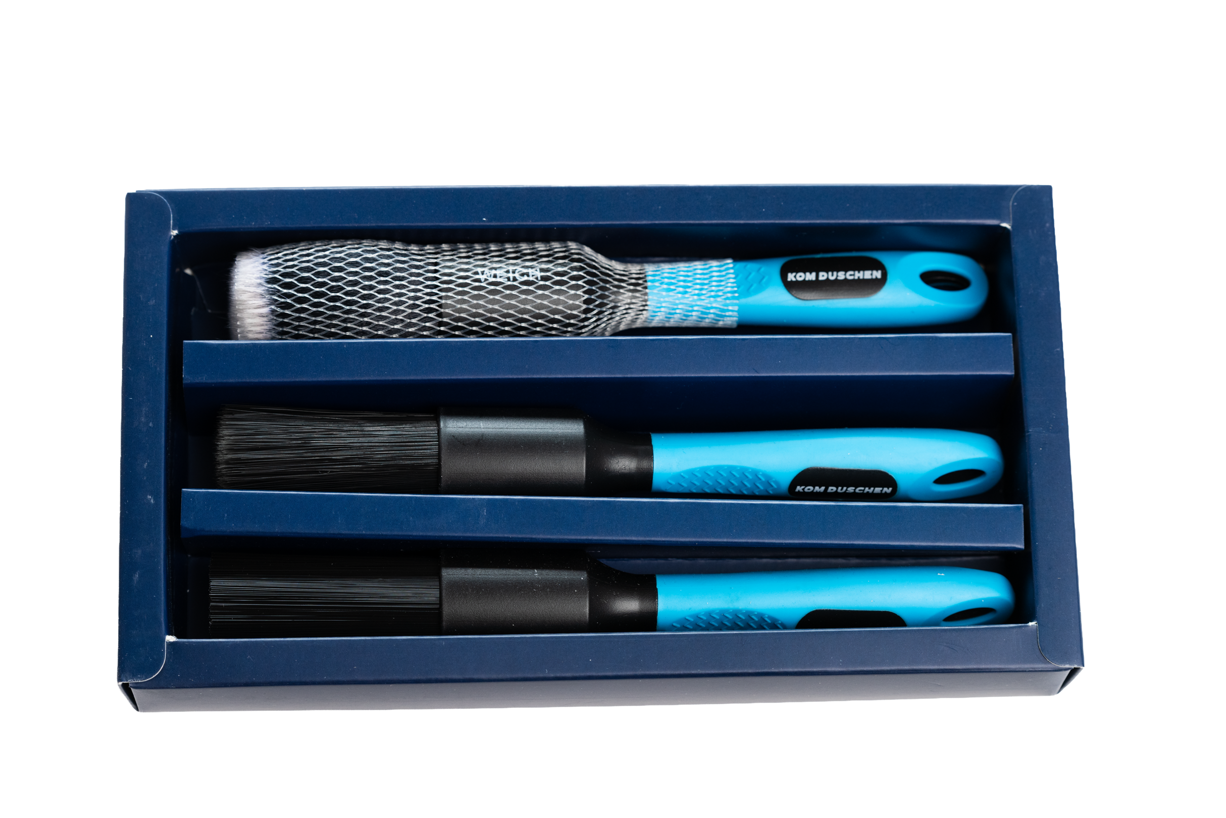 Das Pinselset - Fahrrad Detailing enthält drei Reinigungsbürsten mit blauem Stiel in einer blauen Box, mit zwei kleineren Bürsten unten und einer größeren Bürste oben, die alle teilweise von einem Schutzgitter bedeckt sind.